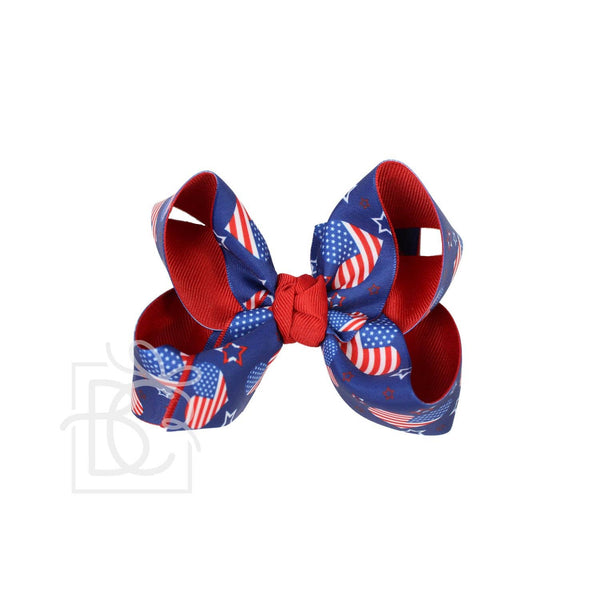 LAYERED PATRIOTIC HEART PRINT BOW ON ALLIGATOR CLIP